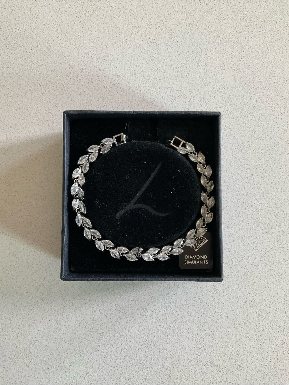Elegant Silver-Tone Leaf Bracelet with Diamond Stimulants - BNIB
